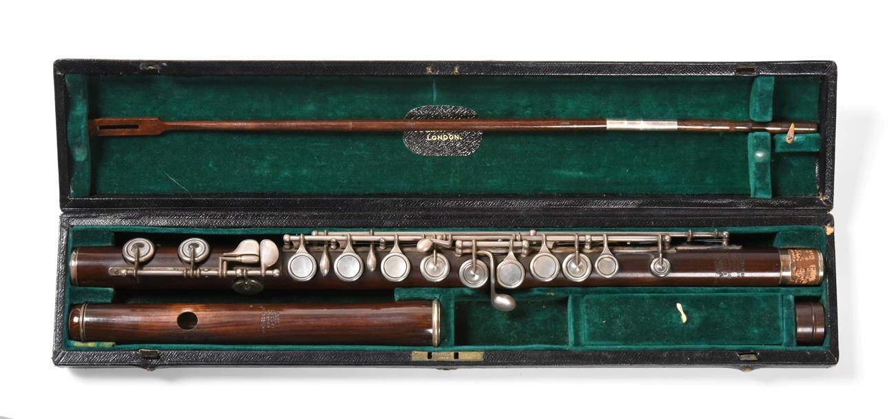 Lot 2031 - Hawkes & Son Flute wooden with one piece body stamped 'Excelsior Sonorous Class Hawkes & Son Makers