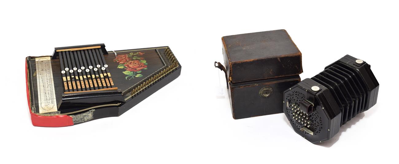 Lot 2065 - Concertina English system, 48 buttons, maker's plaque 'C. Wheatstone & Co. Inventors London' serial