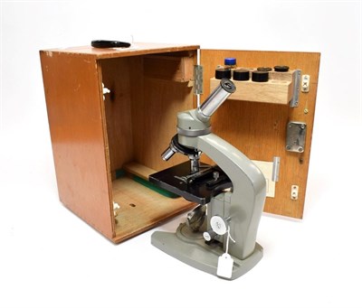 Lot 2109 - Senior Microscopes No.65245, grey lacquered finish with graduated adjustable stage with...