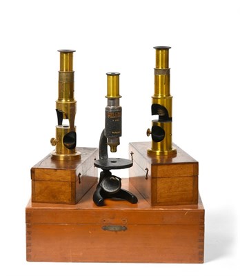 Lot 2110 - Three Student Microscopes Milbro X250 in original case together with two small drum microscopes...