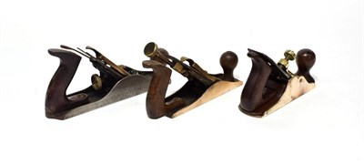 Lot 2120 - Three Woodworking Planes (i) 11'' with Stanley iron and WS lver cap (ii) 9'' brass body,...