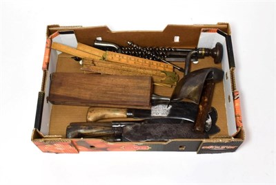 Lot 2125 - Woodworking Tools including cleavers, metal brace and drill bits, two others and a box of rules