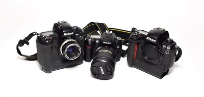Lot 2132 - Nikon Camera Group D1H with Nikkor-H f2 50mm lens, D90 with AF-S f3.5-5.6 18-200mm lens and D1 body