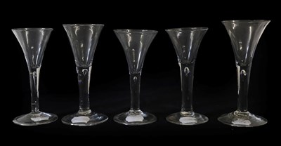 Lot 2 - A Wine Glass, circa 1750, the drawn trumpet bowl on a plain stem with air tear and folded foot,...