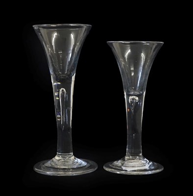 Lot 6 - A Wine Glass, circa 1750, the drawn trumpet bowl on plain stem with air tear and circular foot,...