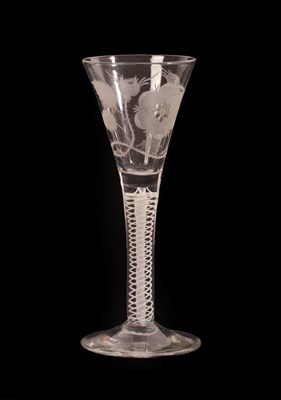 Lot 9 - A Jacobite Wine Glass, circa 1750, the drawn trumpet bowl engraved with a rose with two buds...