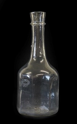 Lot 10 - A Glass Serving Bottle, circa 1740, the cylindrical neck with trailed string ring over an octagonal
