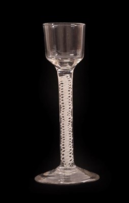 Lot 12 - A Cordial Glass, circa 1750, the ogee bowl on a double series opaque twist stem and circular...