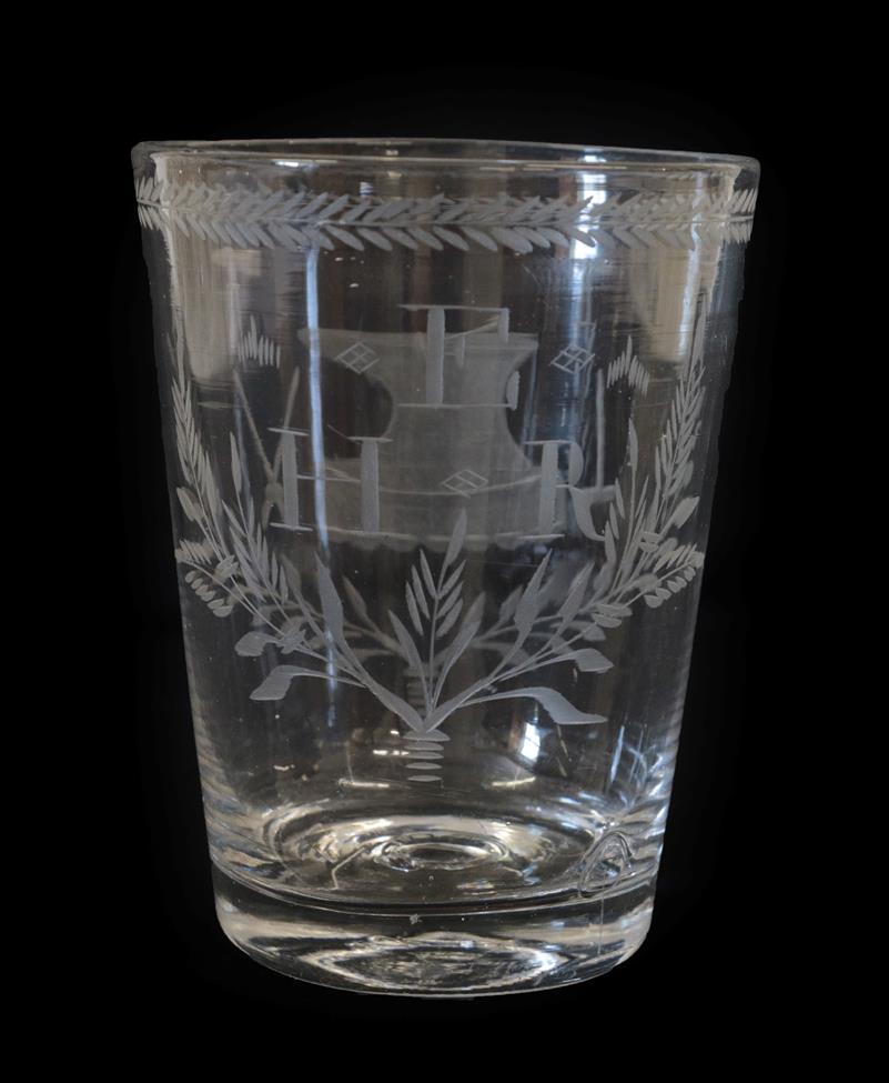 Lot 14 - A Glass Tumbler, circa 1820, engraved with an anvil and blacksmith's implements within a laurel...