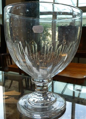 Lot 16 - A Large Glass Goblet, early 19th century, the ovoid bowl with basal flutes on a waisted...
