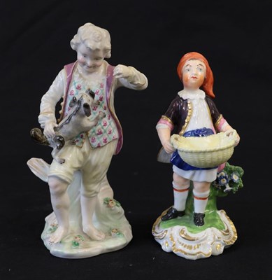 Lot 34 - A Derby Porcelain Figure of a Boy, circa 1770, standing holding a dog on his knee, on a mound base