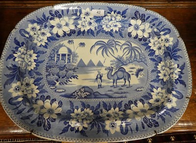 Lot 42 - A Pearlware Meat Platter, circa 1830, printed in underglaze blue with a camel and rider,...