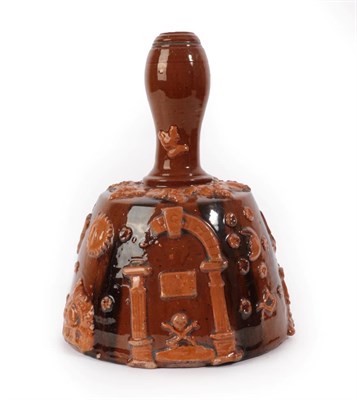 Lot 52 - A Slipware Masonic Decanter, late 19th century, in the form of a mallet, sprigged with various...