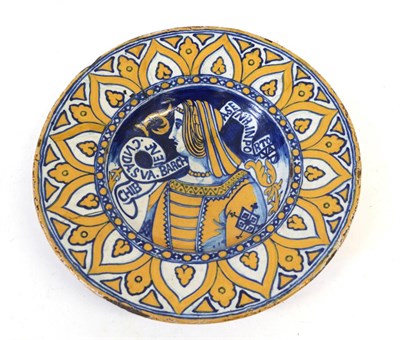 Lot 66 - A Maiolica Bella Donna Dish, in 16th century Deruta style, painted in blue and ochre with a...
