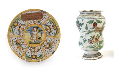 Lot 68 - A Deruta Maiolica Crespina, mid 16th century, painted in colours with a cherub within a...