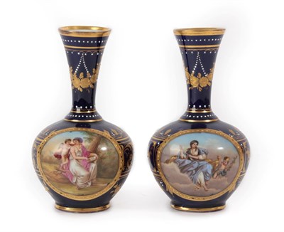 Lot 87 - A Pair of Vienna Style Porcelain Bottle Vases, late 19th century, painted with ''Venus'' and...