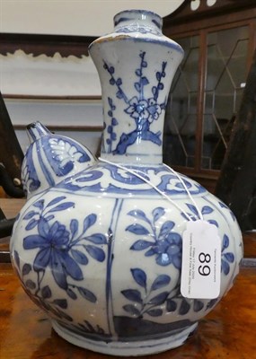Lot 89 - A Chinese Kraak Porcelain Kendi, early 17th century, of traditional form, painted in underglaze...