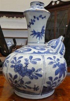 Lot 89 - A Chinese Kraak Porcelain Kendi, early 17th century, of traditional form, painted in underglaze...