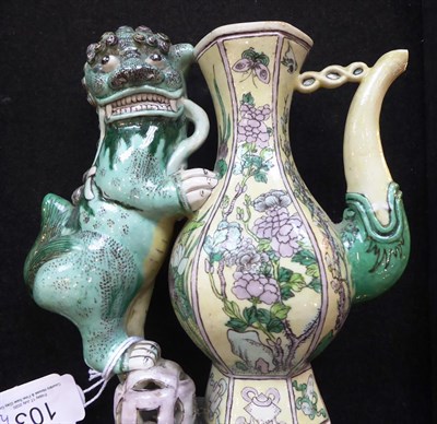 Lot 103 - A Pair of Chinese Bisque Ewers and A Cover, in Kangxi style, of baluster form with dog of fo...