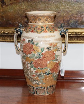 Lot 113 - A Satsuma Earthenware Vase, Meiji period, of baluster form with flared neck and twin mask...