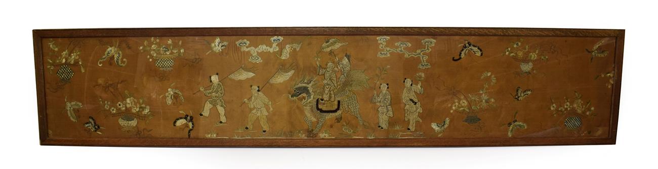 Lot 119 - A Chinese Silkwork Panel, Qing dynasty, worked in coloured threads of a deity and attendant...