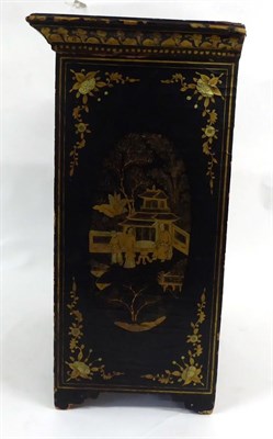 Lot 121 - A Chinese Export Lacquered Table Cabinet, mid 19th century, with two panelled doors with figures in