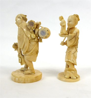Lot 149 - A Japanese Ivory and Shibayama Okimono as a Drum Seller, Meiji period, standing with his...