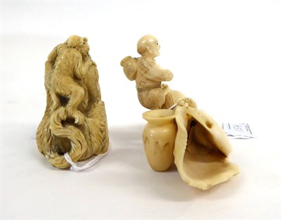 Lot 154 - A Japanese Ivory Okimono as a Monkey, Meiji period, an infant on its back, signed, 8.5cm high;...
