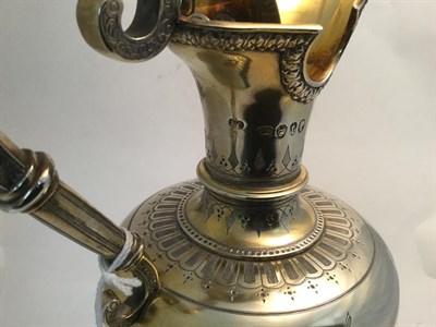 Lot 166 - A Victorian Parcel-Gilt Silver Claret-Jug, by Edward Charles Brown, London, 1874, baluster and...