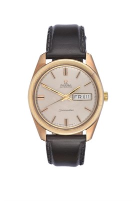 Lot 207 - A 9 Carat Gold Automatic Day/Date Centre Seconds Wristwatch, signed Omega, model: Seamaster,...