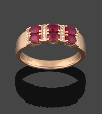 Lot 235 - A Ruby and Diamond Ring, four rows of five eight-cut diamonds alternate with three rows of pairs of