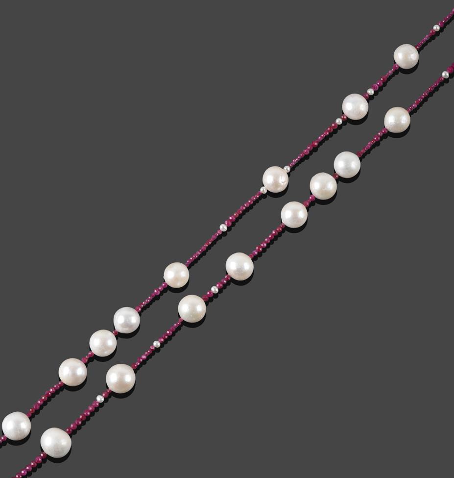 Lot 237 - A Ruby and Cultured Pearl Necklace, faceted ruby roundel beads spaced by cultured pearls,...