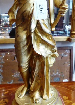 Lot 256 - After Adrien Etienne Gaudez: ''Caecilia'', A Gilt Bronze Figure of a Maiden, standing in...