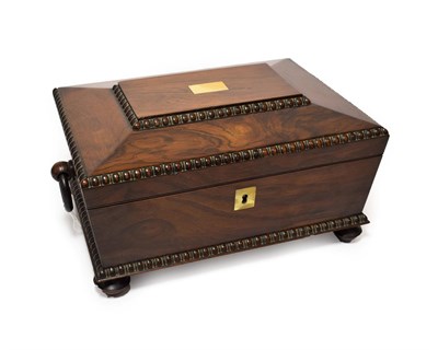 Lot 270 - A Regency Rosewood Work Box, circa 1820, of rectangular form with ring handles and gadrooned...