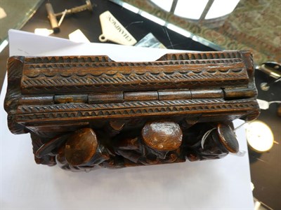 Lot 277 - A Scottish Treen Table Snuff Box, 19th century, of rectangular form, carved in high relief with...