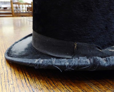 Lot 280 - A Dunn & Co Silk Top Hat, 20th century, in a stitched leather fitted case