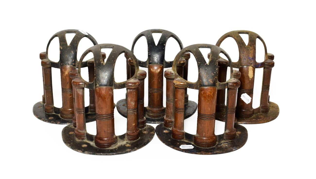 Lot 301 - A Set of Five Musgrave's Patent Mahogany and Cast Iron Bridle Racks, early 20th century, 20cm long