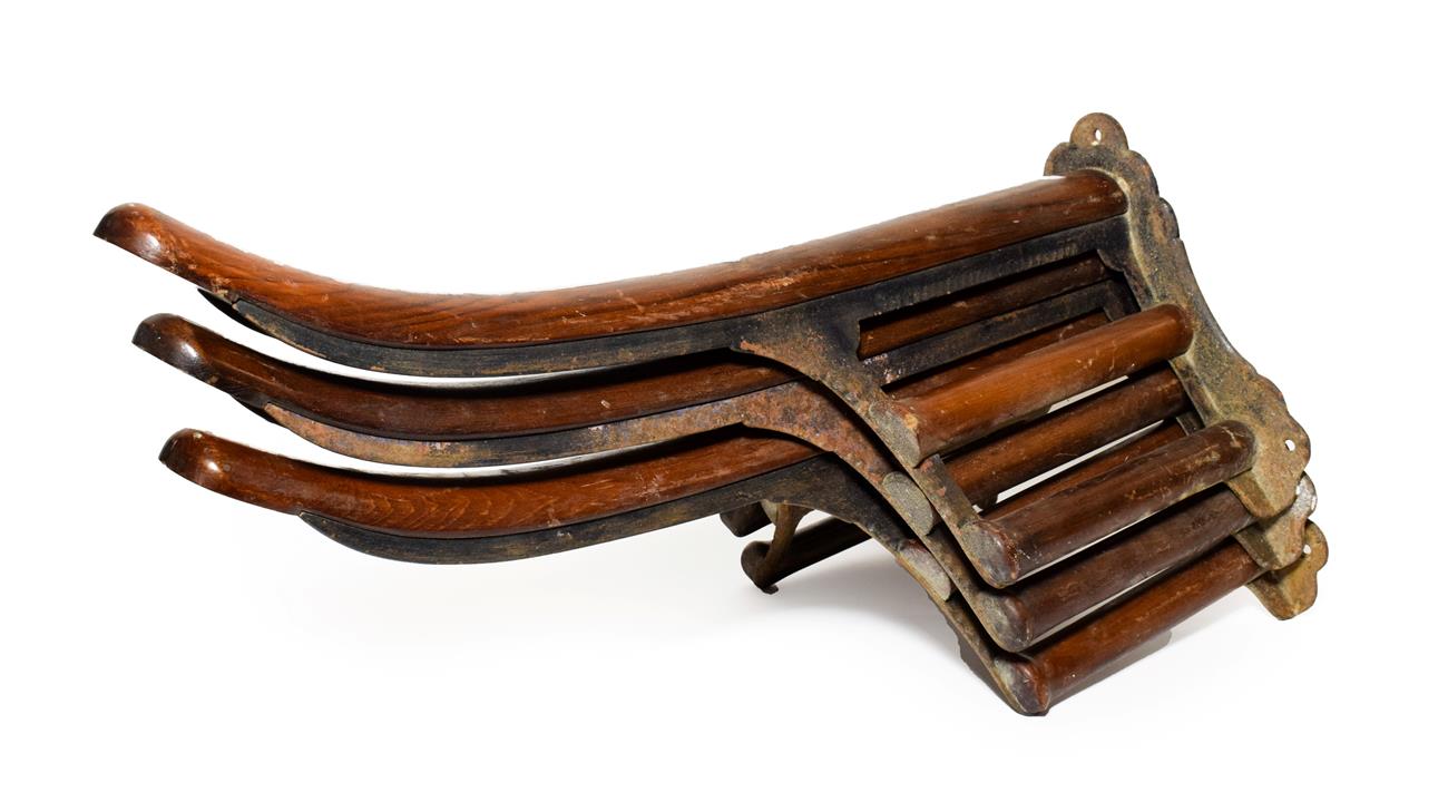Lot 302 - A Set of Three Musgrave's Patent Mahogany and Cast Iron Saddle Racks, early 20th century, 64cm long