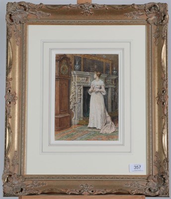Lot 357 - George Goodwin Kilburne RI, RBA (1839-1924) The Timepiece - an elegant lady standing in an interior