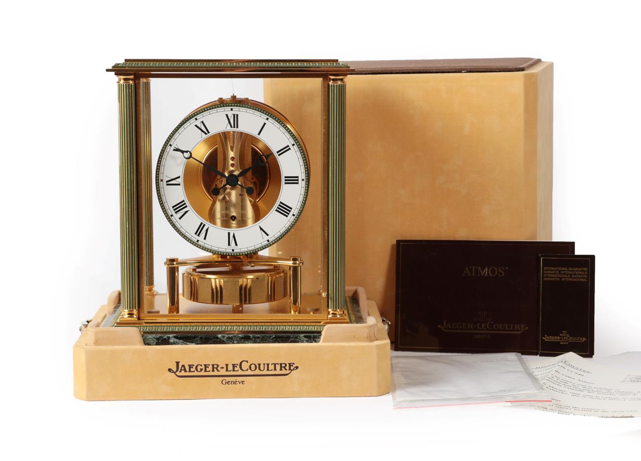 Lot 454 - A Brass and Marble Atmos Clock, signed Jaeger LeCoultre, circa 1985, four glass panels with...
