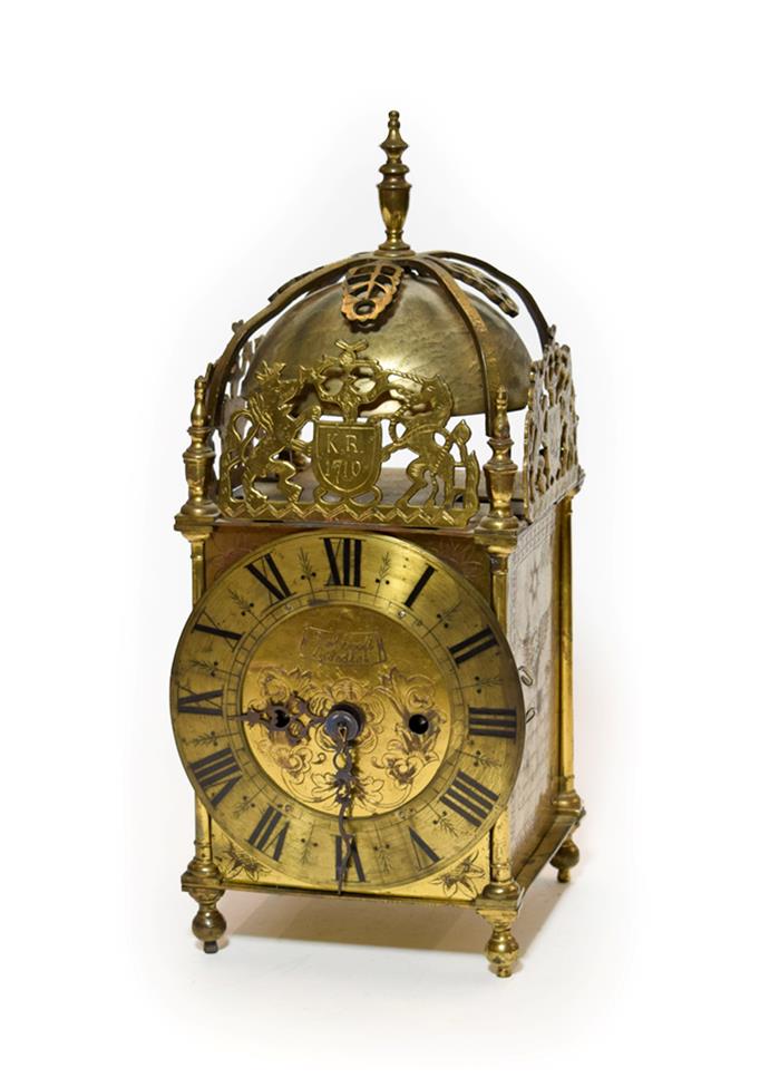 Lot 455 - An 18th Century Style Brass Lantern Clock, pierced frets, four posted frame case, engraved side...
