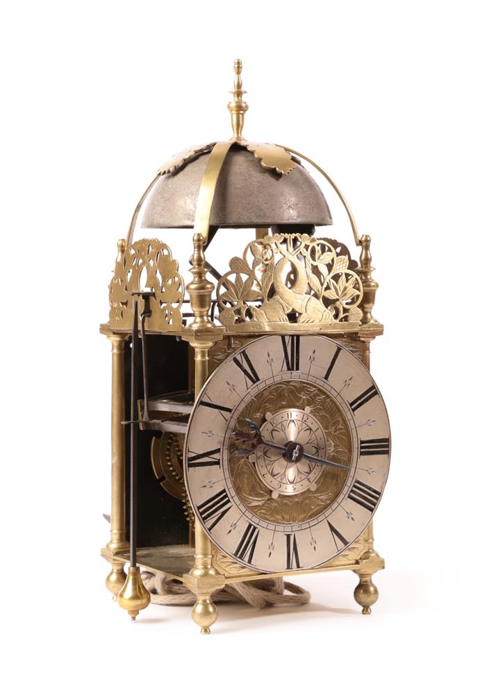 Lot 458 - A 17th Century Brass Striking Lantern Clock with Very Unusual Early Conversions to a Side...