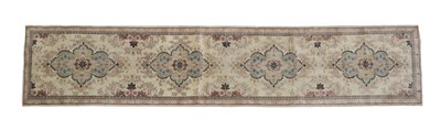 Lot 503 - Narrow Kashan Runner Central Iran, 2nd half 20th century The ivory field with four flowerhead...