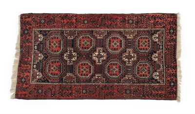 Lot 505 - Balouch Rug Persian/Afghan Frontier, circa 1900 The field with two columns of octagonal güls...