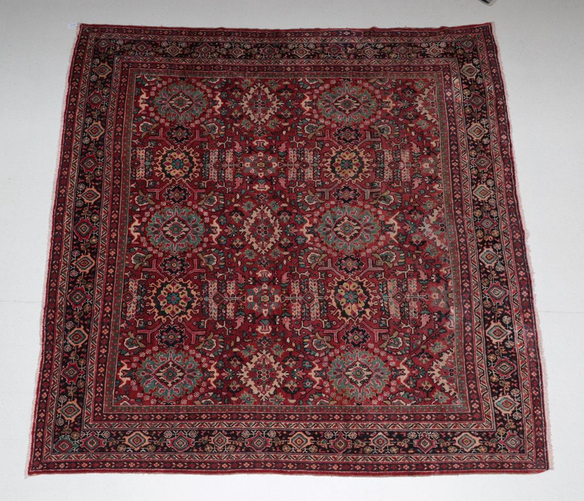 Lot 511 - Mahal Carpet of unusual size West Iran, circa 1940 The brick red field with an all over design...