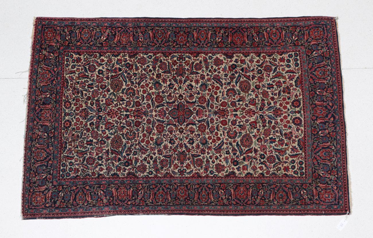 Lot 512 - Kasvin Rug North West Iran, circa 1940 The cream field richly decorated with palmettes...