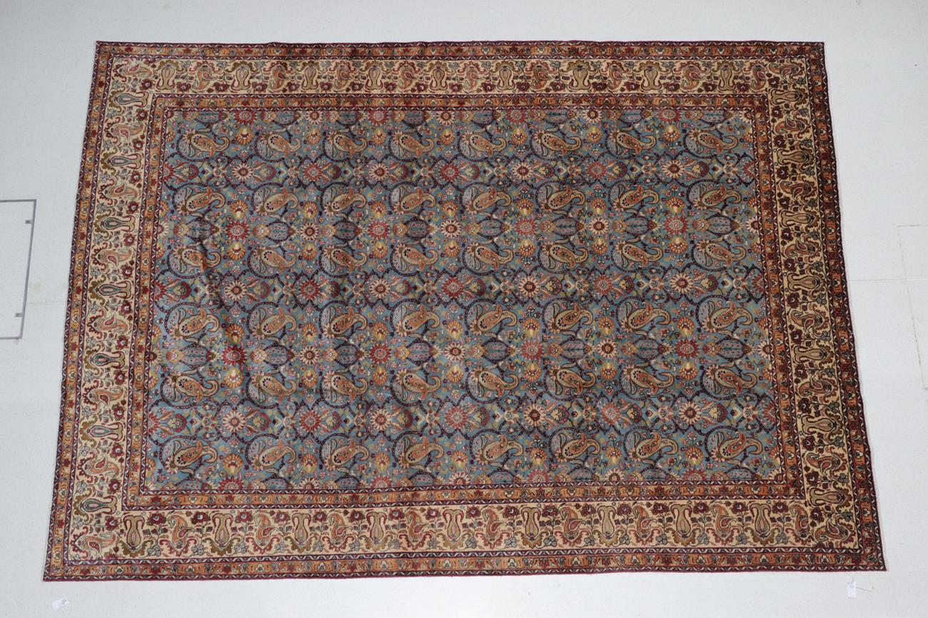 Lot 515 - Good Tabriz Carpet North West Iran, circa 1950 The powder blue field with an allover lattice design
