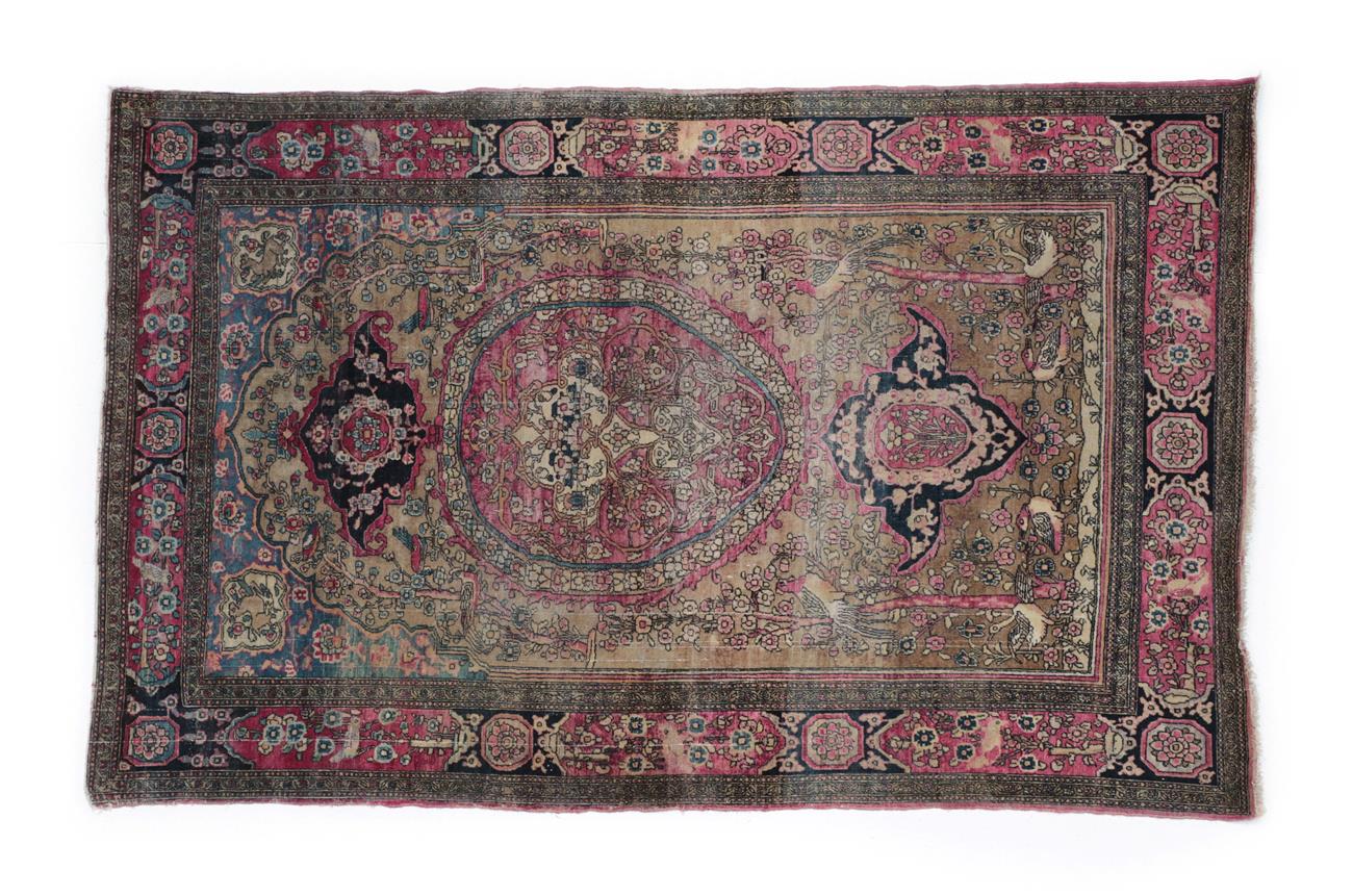 Lot 519 - Isfahan Rug Central Iran, circa 1920 The field of flowering trees centred by a raspberry...