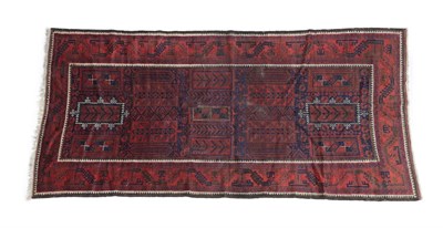 Lot 521 - Timuri/Balouch Carpet West Afghanistan, circa 1910 The indigo field with columns of panels enclosed