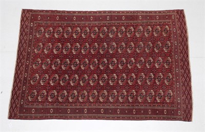Lot 526 - Tekke Main Carpet Emirate of Bukhara, circa 1900 The brick red field with five columns of quartered